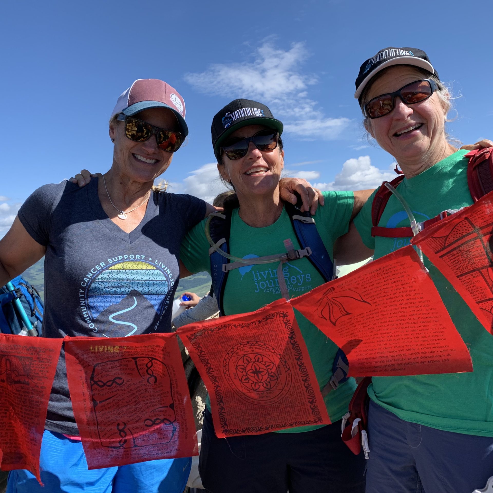 Living Journeys, women at summit hike