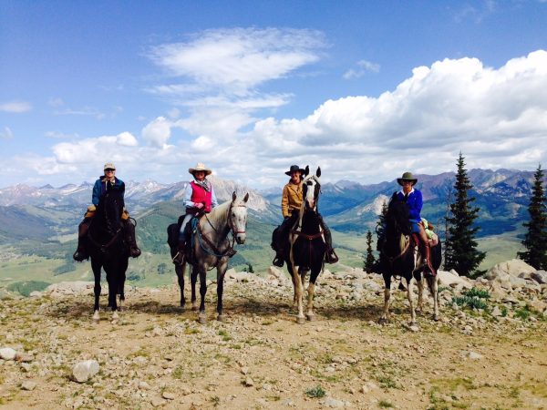Living Journeys, riders on horseback in mountains